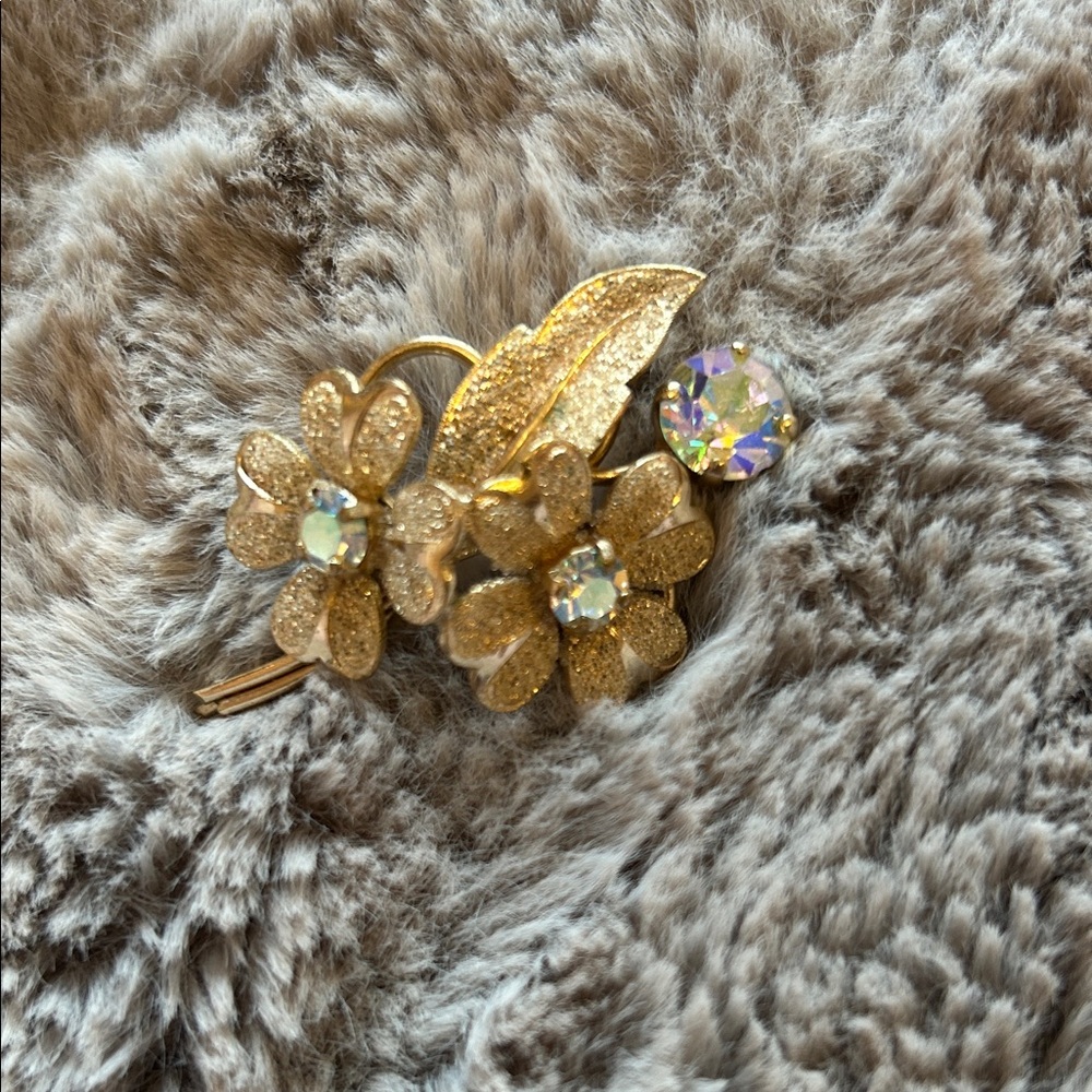 Elegant Gold Floral Brooch with Aurora Borealis